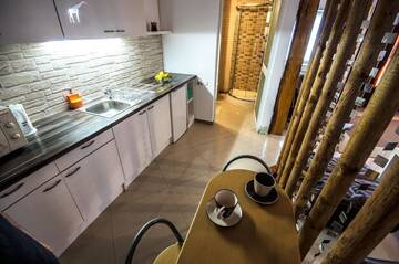Фото номера Номер-студио Делюкс Гостевой дом Neustadt Villa г. Кристьян 7