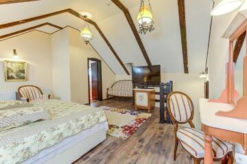 Фото номера Двухуровневый люкс Курортные отели Conacul Ambient г. Кристьян 4