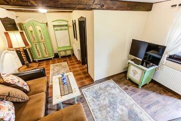 Фото номера Двухуровневый люкс Курортные отели Conacul Ambient г. Кристьян 7