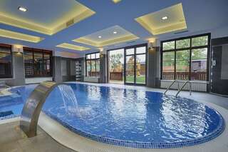 Фото Курортные отели Conacul Ambient г. Кристьян